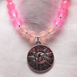 No735 Beautiful handmade long necklace with silver sun and moon pendant